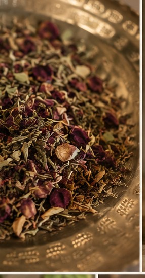 A tray of botanicals, rose petals, and tea at The Ritual Bar